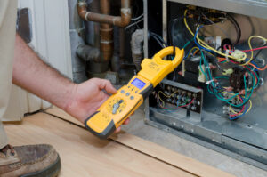 HVAC Technician Checking Heat Pump